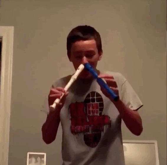 Possessed boy playing the recorder