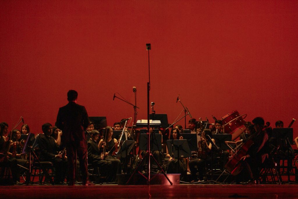 Orchestra performing on stage